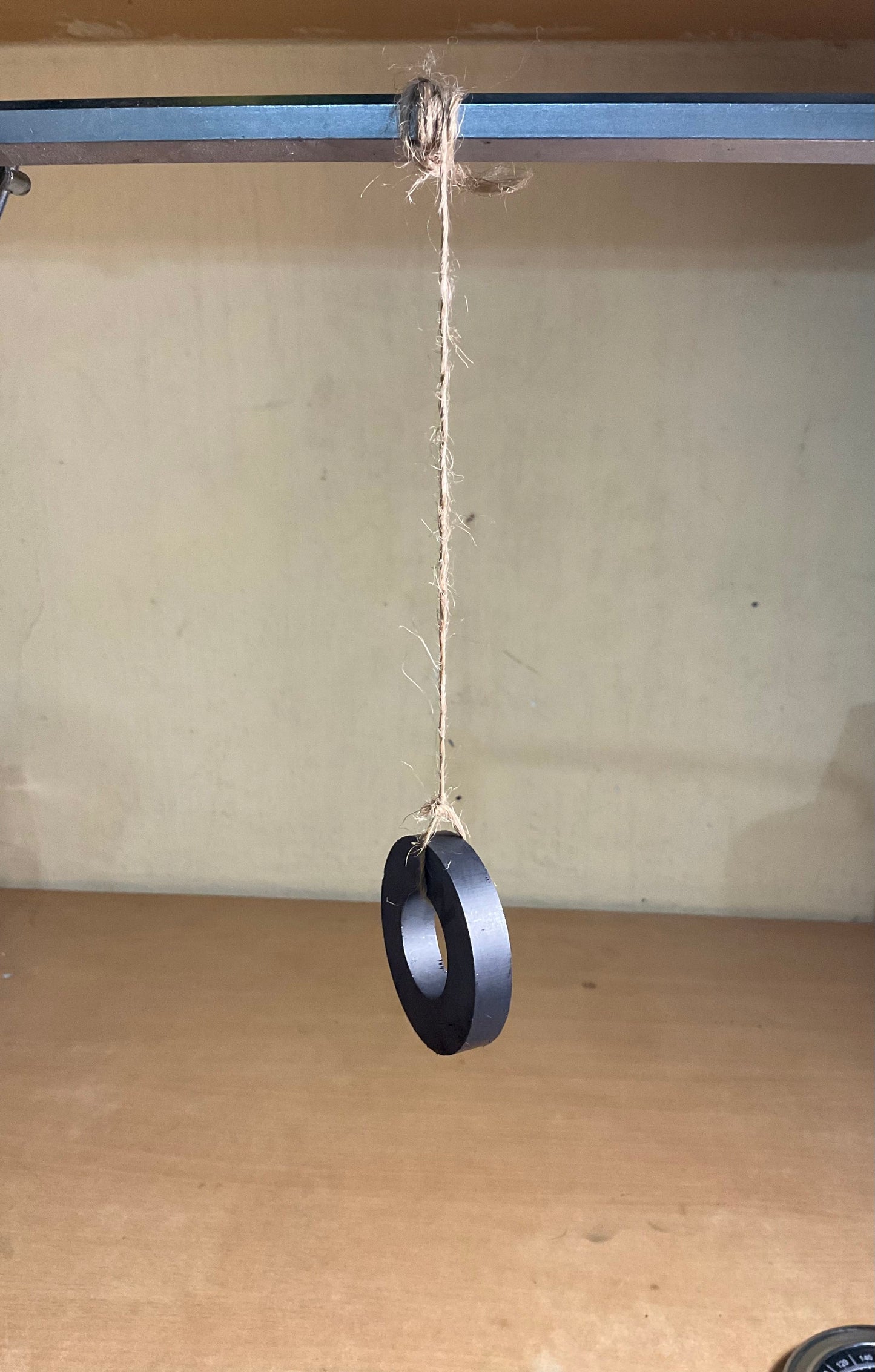 Hanging Compass — Discovering Direction Using a Freely Suspended Magnet